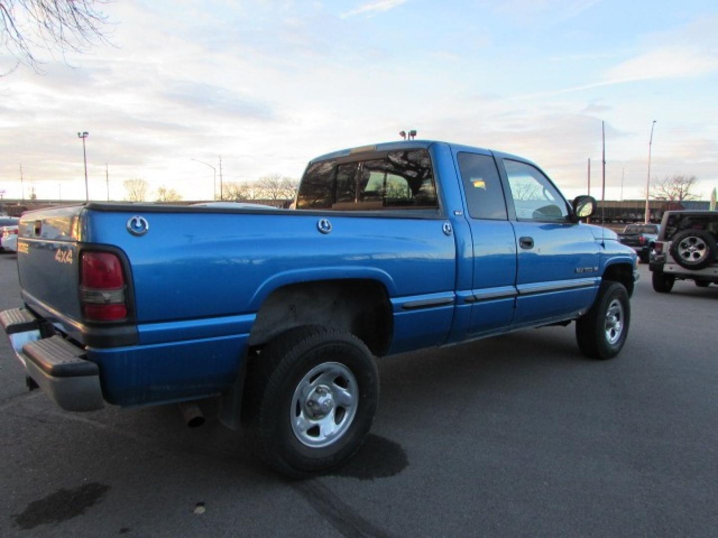 1999 Blue /Gray Dodge Ram 1500 SLT (3B7HF13Y9XG) with an 5.2 V8 Engine engine, 5 speed manual transmission, located at 4562 State Avenue, Billings, MT, 59101, (406) 896-9833, 45.769516, -108.526772 - Photo#3